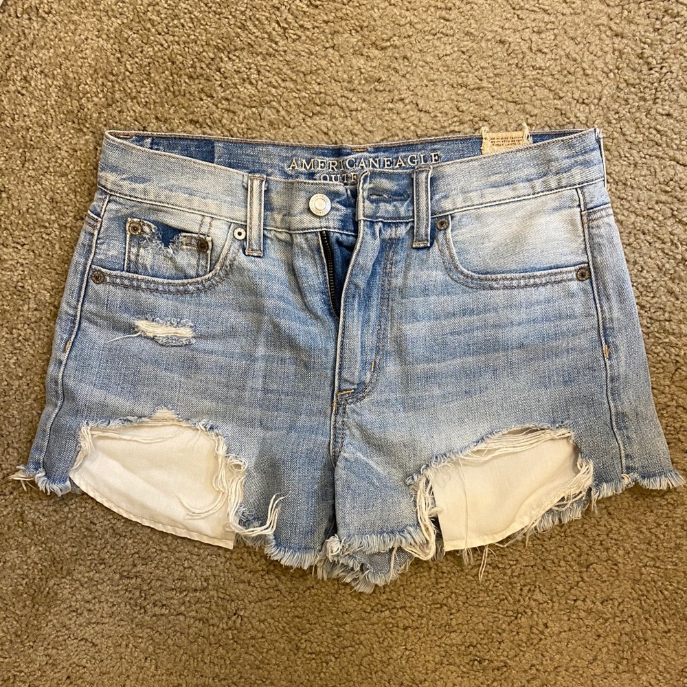Distressed denim mini shorts.